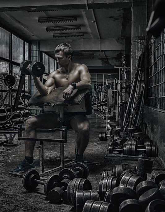 Man in rusty gym